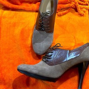 Tan suede and brown leather oxfords.